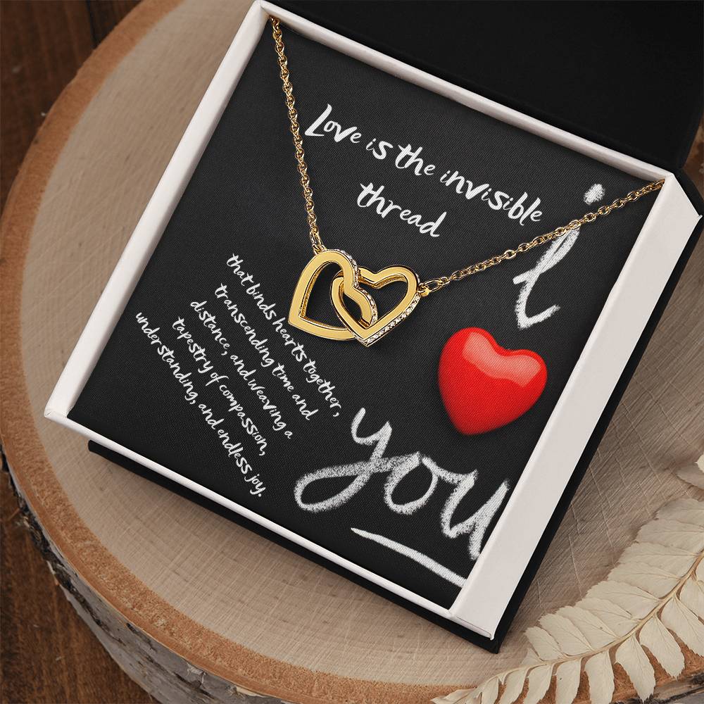 Gift for your love-Featuring two lovely hearts embellished with cubic zirconia crystals, the Interlocking Hearts necklace