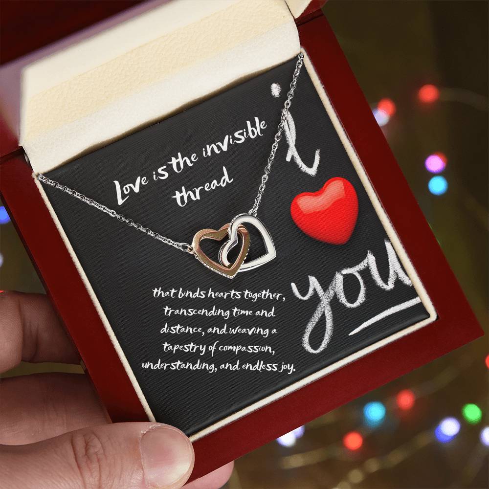 Gift for your love-Featuring two lovely hearts embellished with cubic zirconia crystals, the Interlocking Hearts necklace